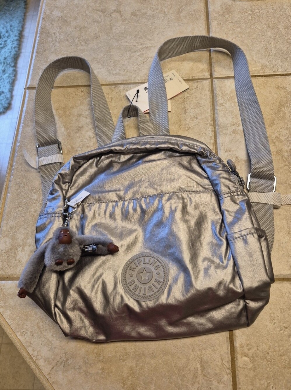 Kipling Ferris Smooth Silver Metallic Backpack with Monkey Charm NWT